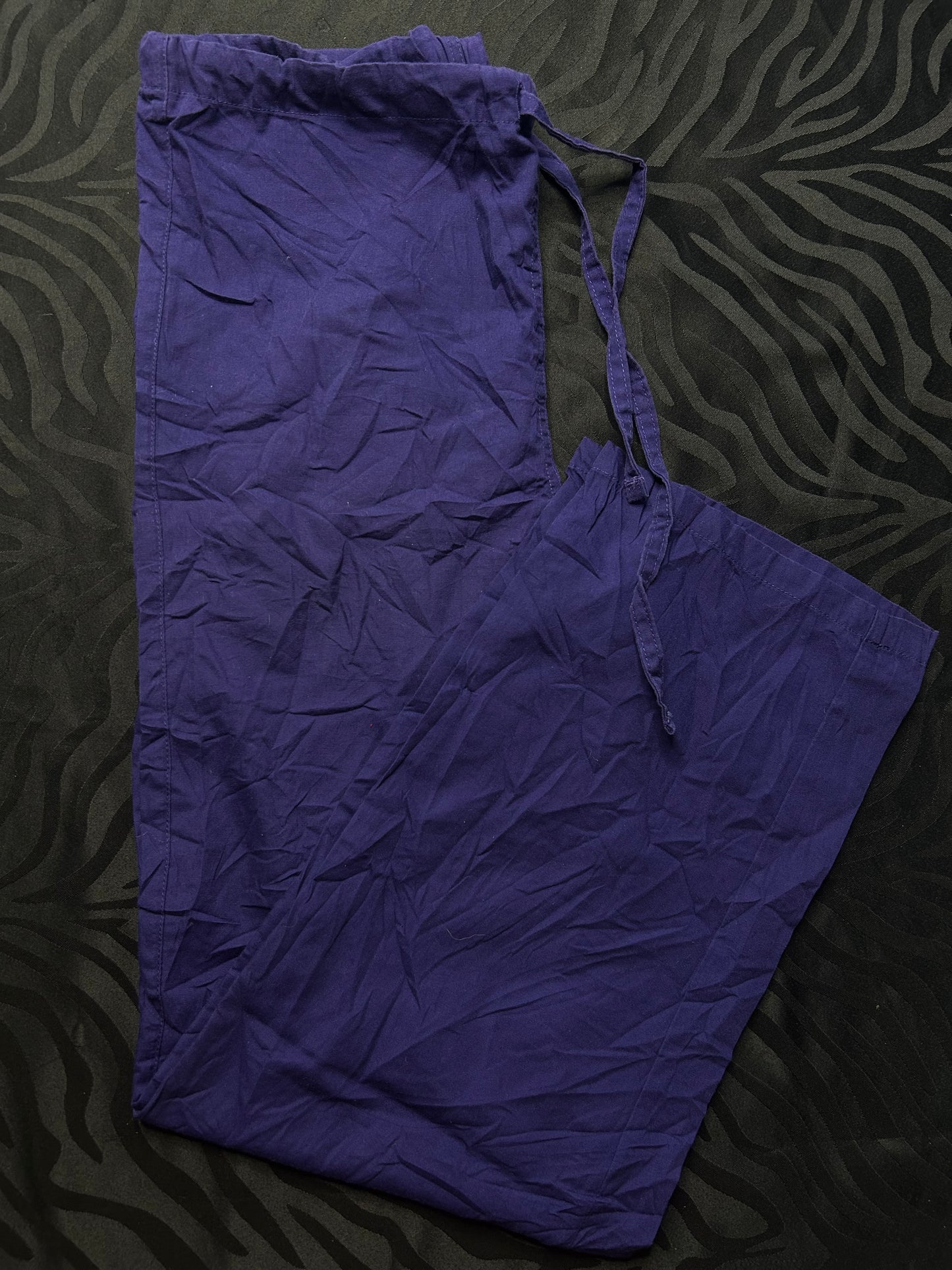 Pantalón morado talla XS