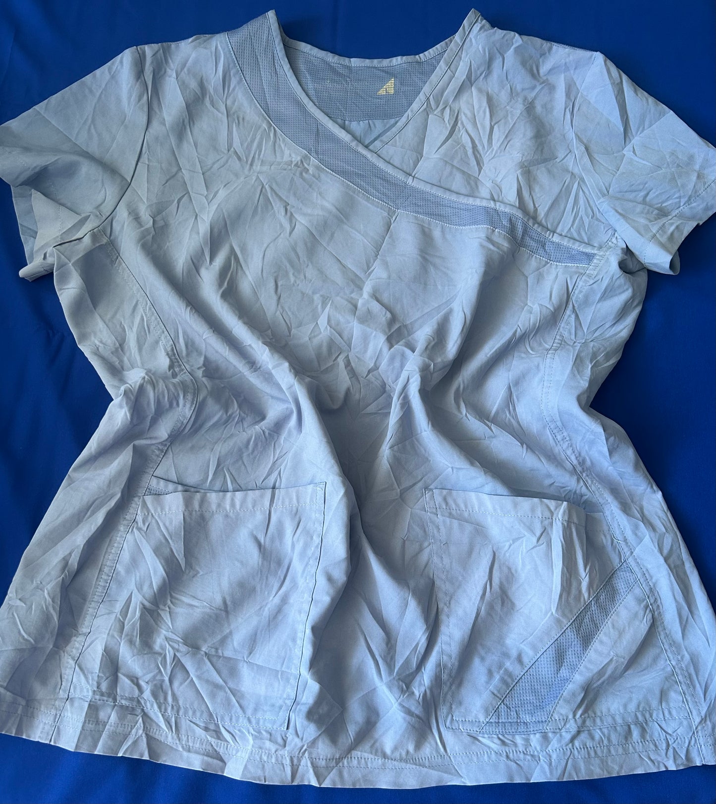Delantal celeste talla L